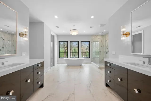 a bedroom with a bed window and a table