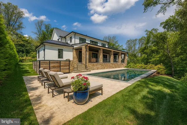 a patio with table and chairs