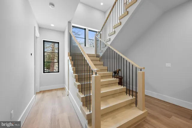 a view of a living room and entryway
