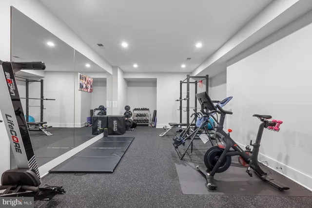 a view of a backyard with swimming pool