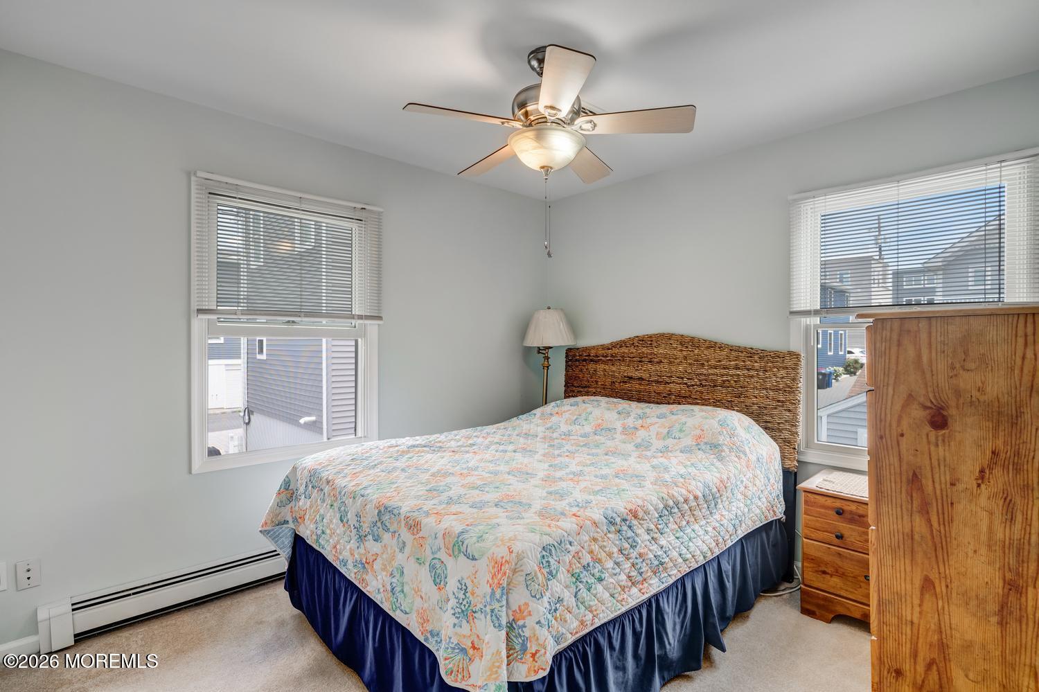 19 Shore Way Lavallette, NJ 08735 - Photo 19 of 38 a bedroom with a bed and window