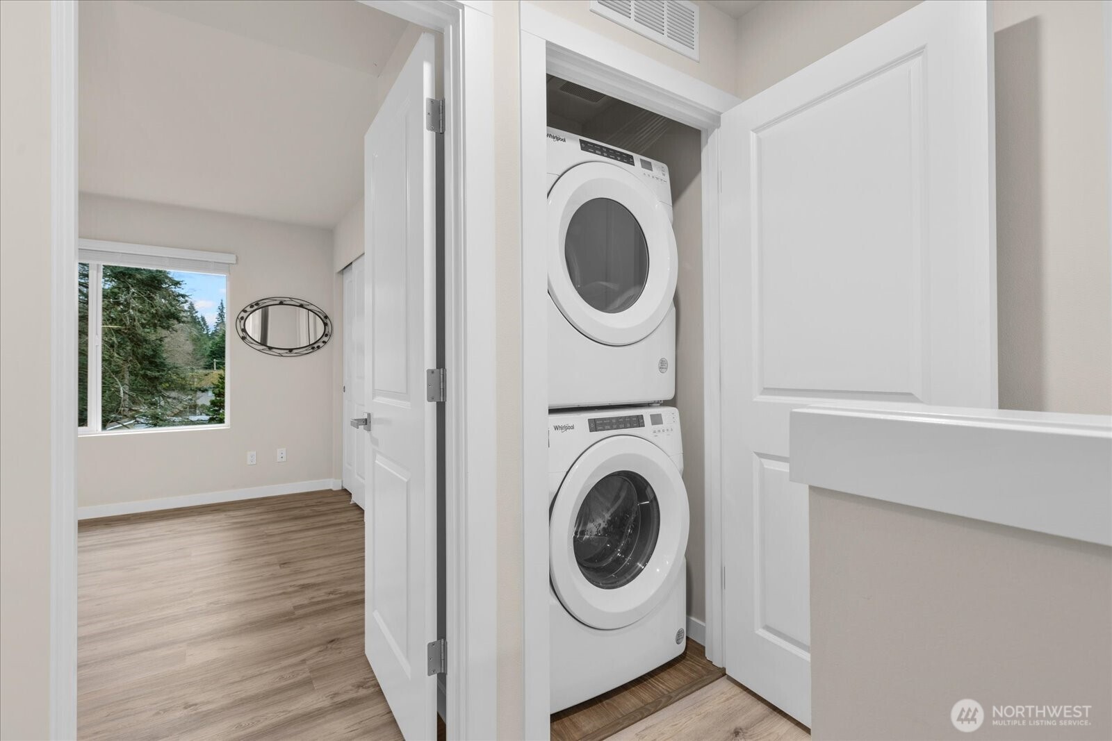 23413 Edmonds Way, Unit A2 Edmonds, WA 98026 - Photo 17 of 40 a view of a hallway with washer and dryer