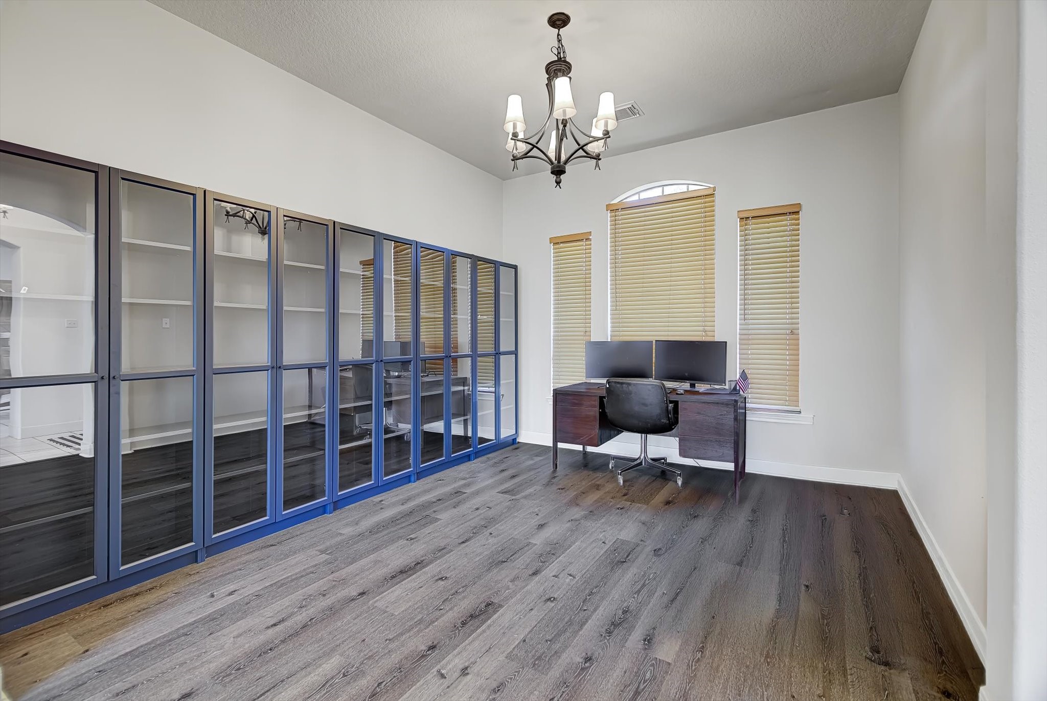 3850 Farm To Market 1010 Road Cleveland, TX 77327 - Photo 16 of 49 a living room with furniture and a wooden floor
