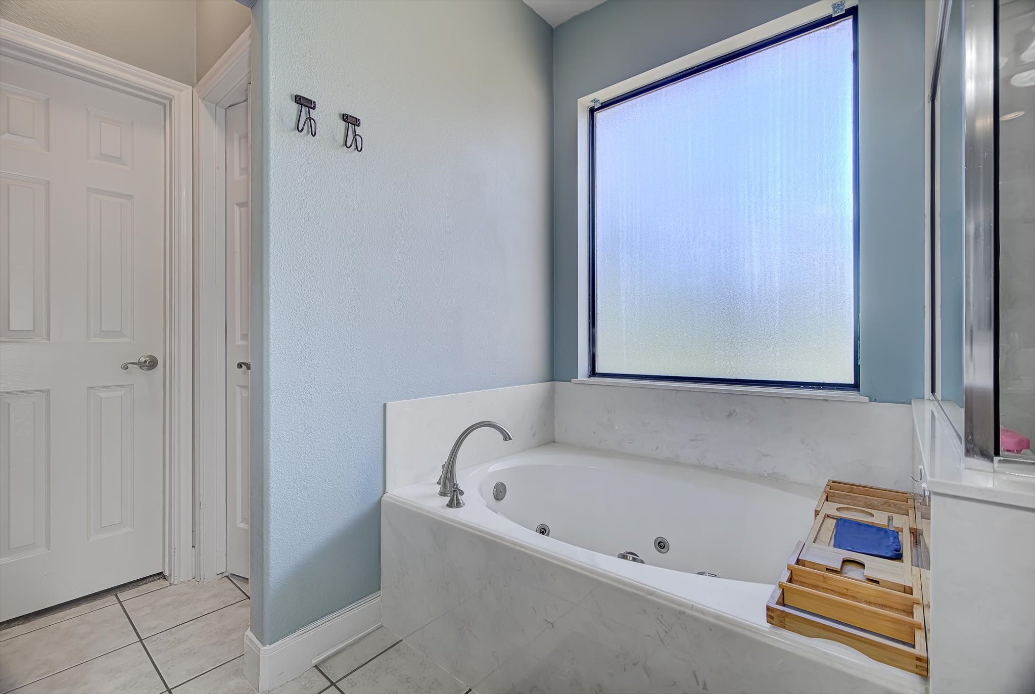 3850 Farm To Market 1010 Road Cleveland, TX 77327 - Photo 23 of 49 a bathroom with a bathtub and a shower