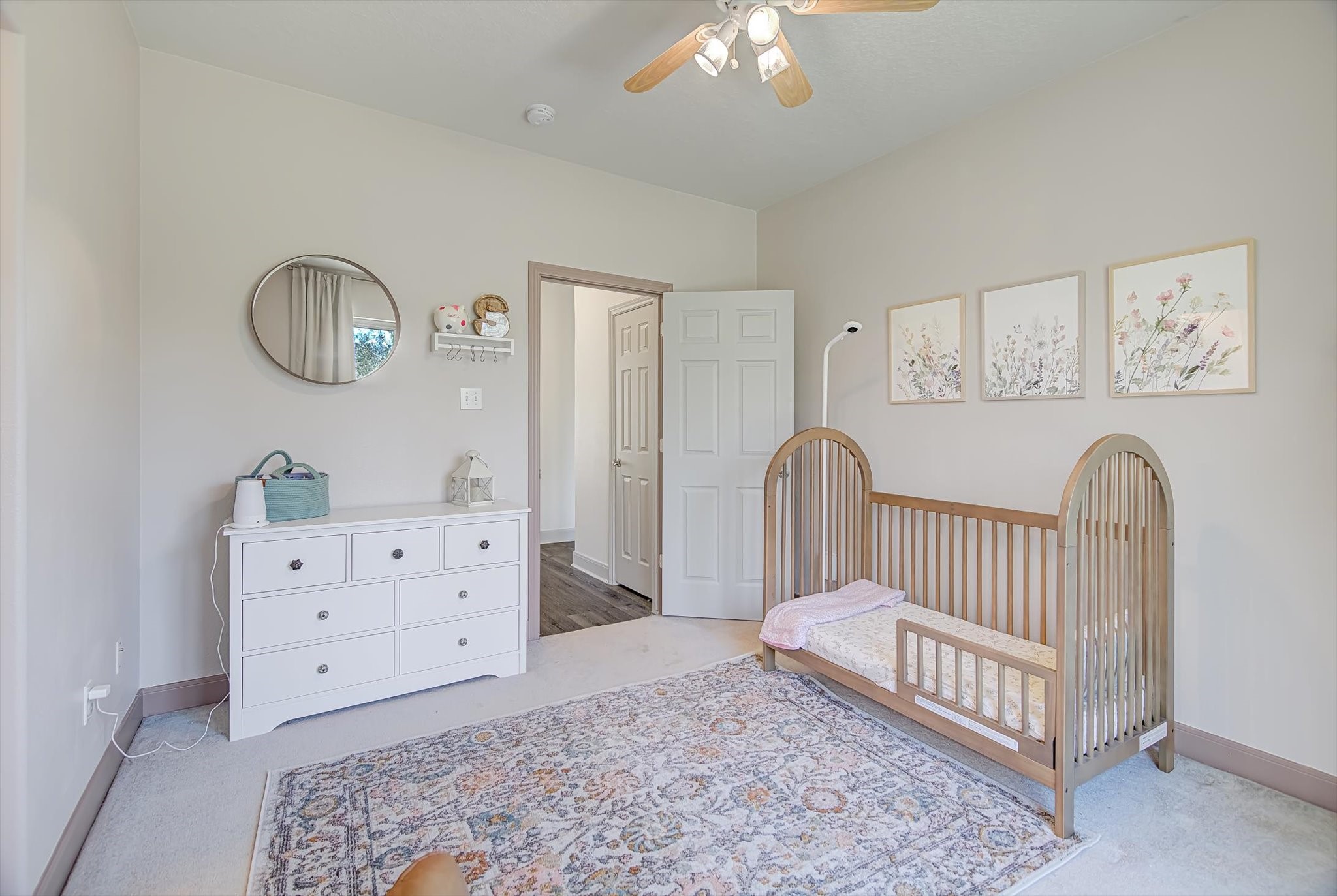 3850 Farm To Market 1010 Road Cleveland, TX 77327 - Photo 25 of 49 a view of a bedroom with baby crib and furniture