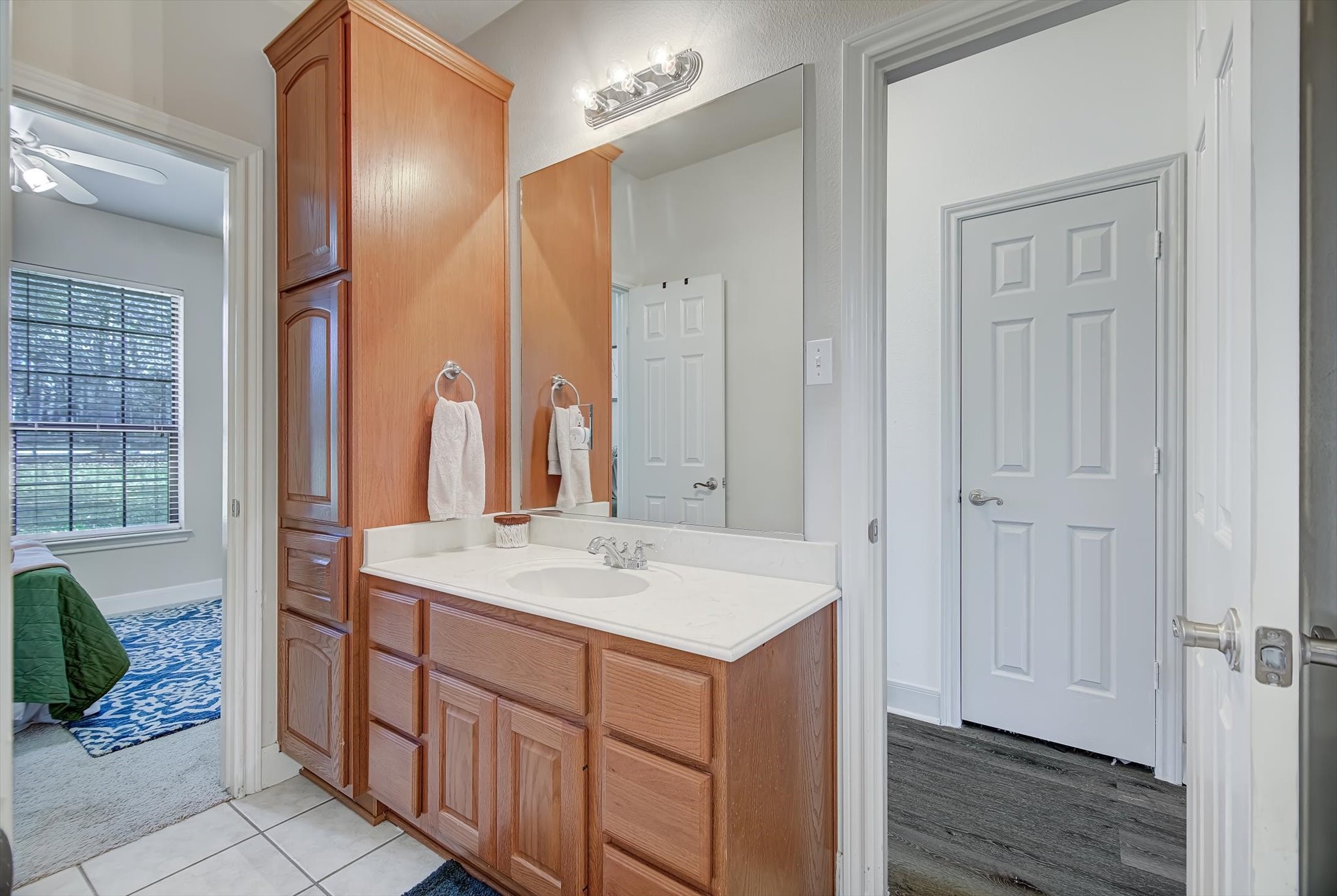 3850 Farm To Market 1010 Road Cleveland, TX 77327 - Photo 29 of 49 a bathroom with a sink and a mirror