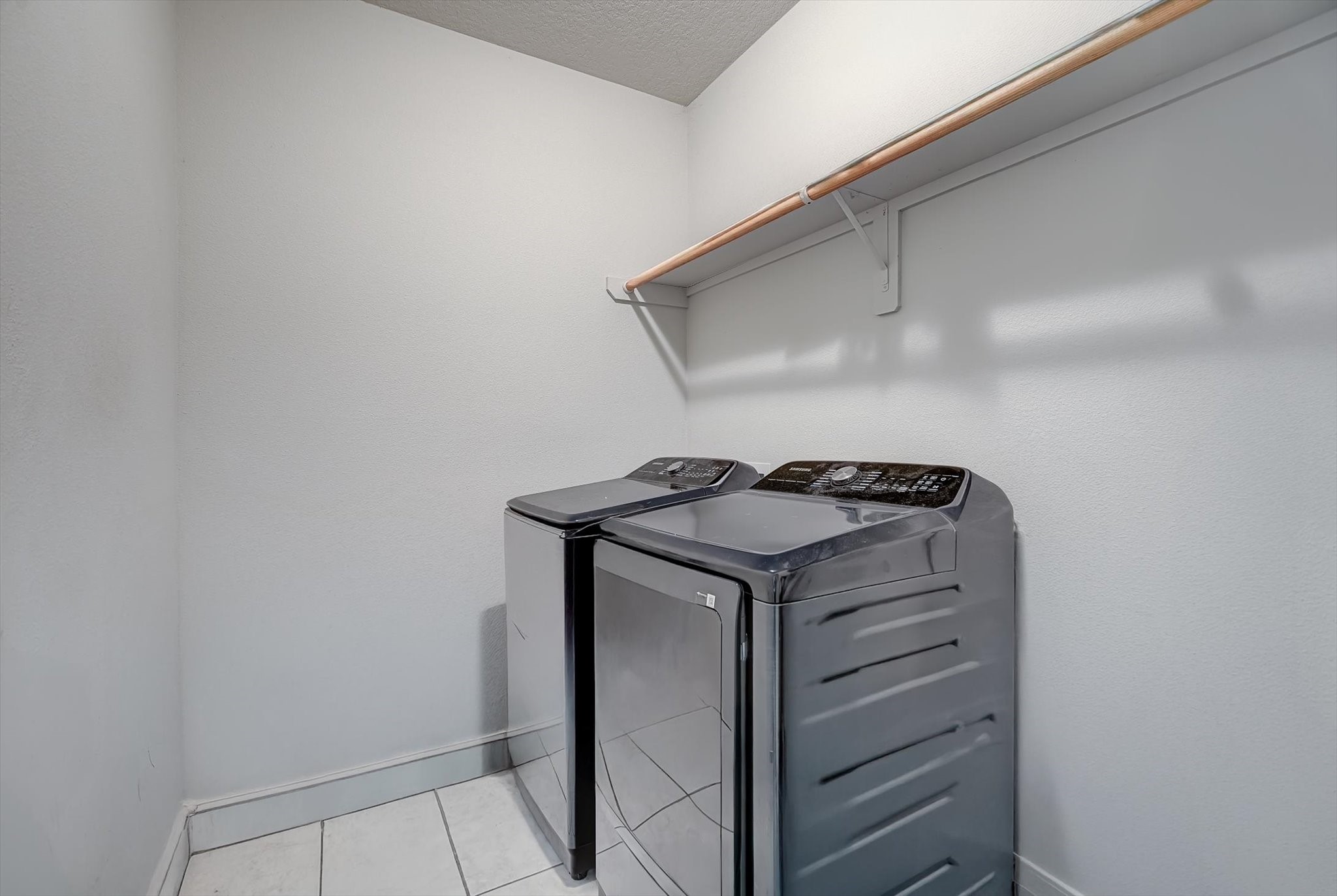 3850 Farm To Market 1010 Road Cleveland, TX 77327 - Photo 32 of 49 a utility room with washer and dryer