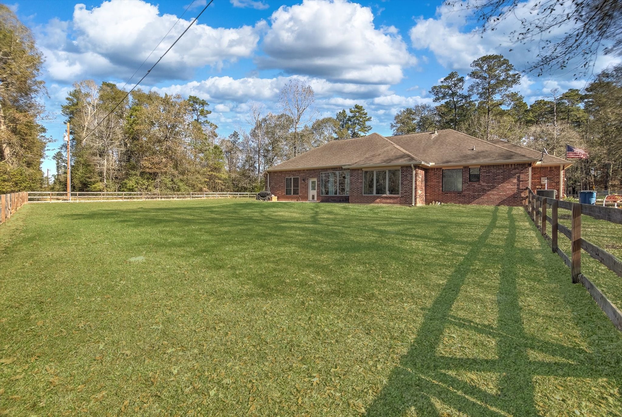 3850 Farm To Market 1010 Road Cleveland, TX 77327 - Photo 37 of 49 a big yard with large trees
