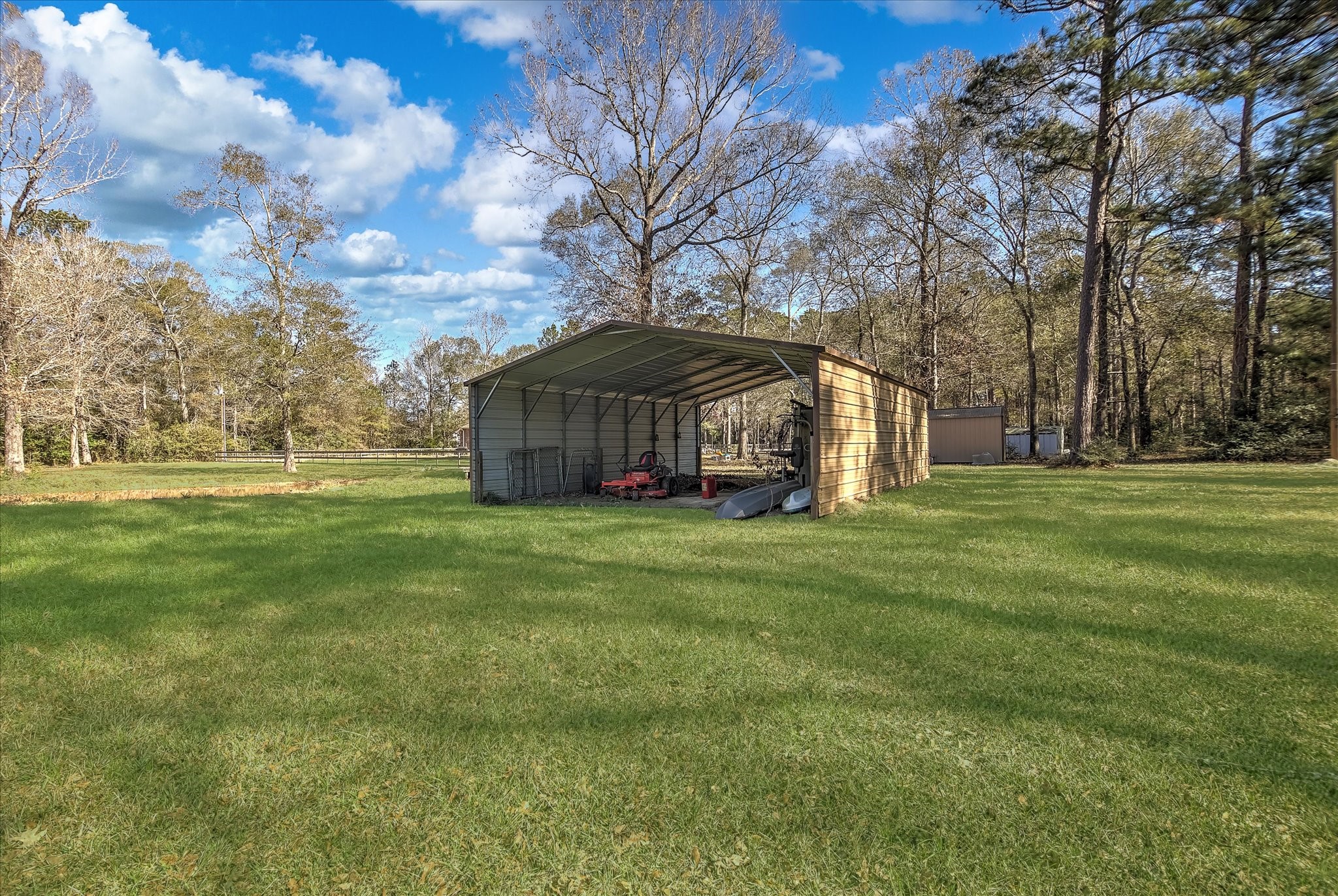 3850 Farm To Market 1010 Road Cleveland, TX 77327 - Photo 42 of 49 a view of a house with a big yard