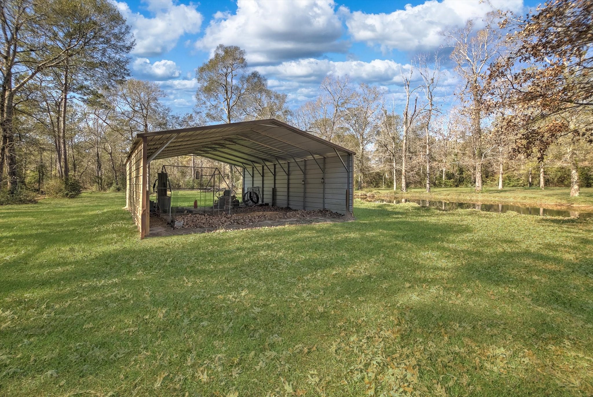 3850 Farm To Market 1010 Road Cleveland, TX 77327 - Photo 44 of 49 a view of a yard in front of the house