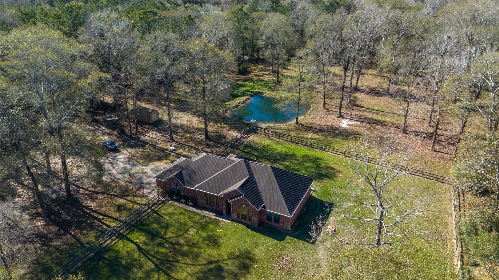 3850 Farm To Market 1010 Road Cleveland, TX 77327 - Photo 49 of 49 a aerial view of a house with a yard