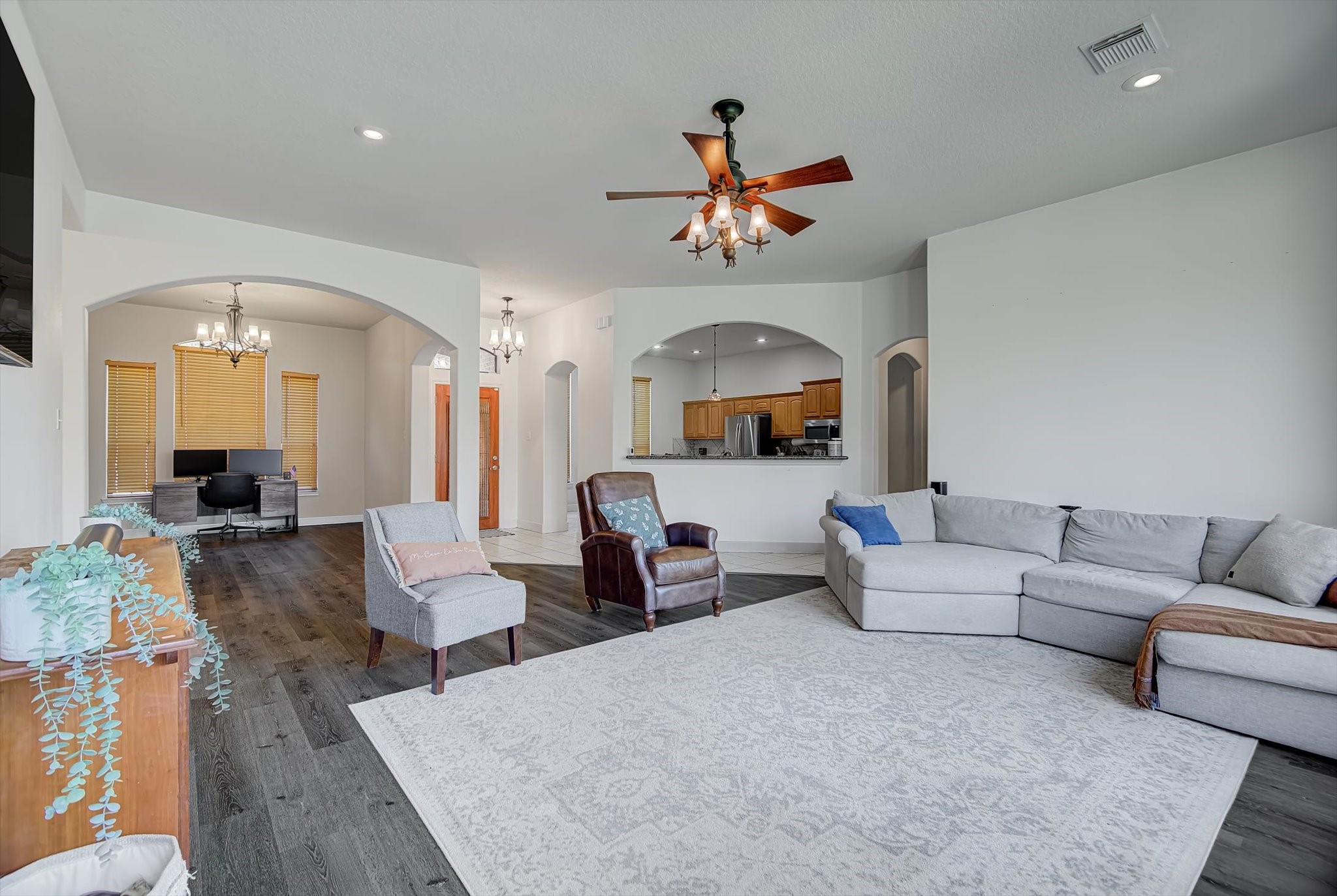 3850 Farm To Market 1010 Road Cleveland, TX 77327 - Photo 7 of 49 a living room with fireplace furniture and a wooden floor
