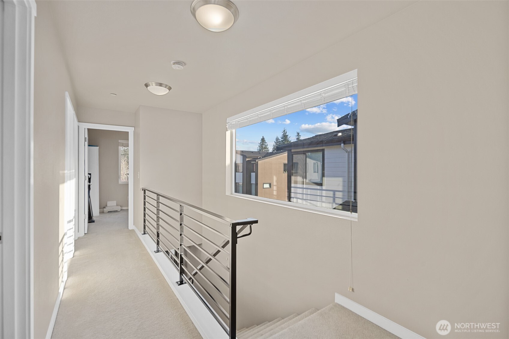 729 112th Street Southwest, Unit G1 Everett, WA 98204 - Photo 15 of 32 a view of a hallway with staircase