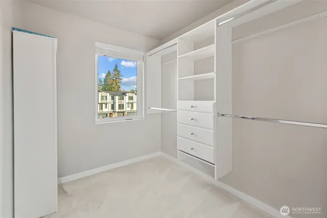 a view of an empty walk in closet