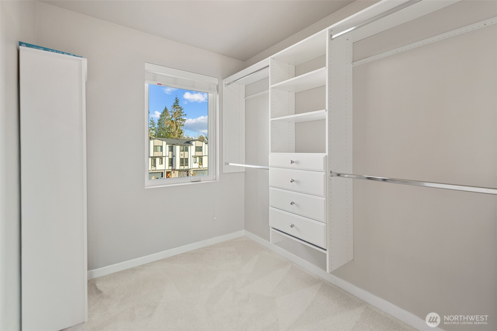 729 112th Street Southwest, Unit G1 Everett, WA 98204 - Photo 19 of 32 a view of an empty walk in closet
