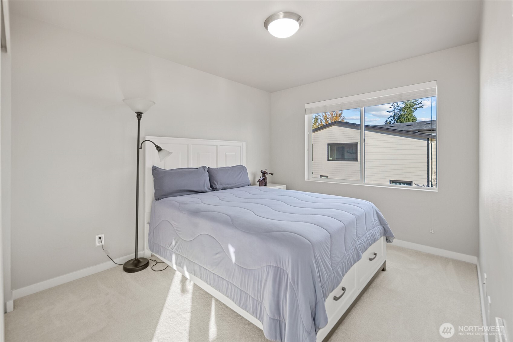 729 112th Street Southwest, Unit G1 Everett, WA 98204 - Photo 22 of 32 a bedroom with a bed and window