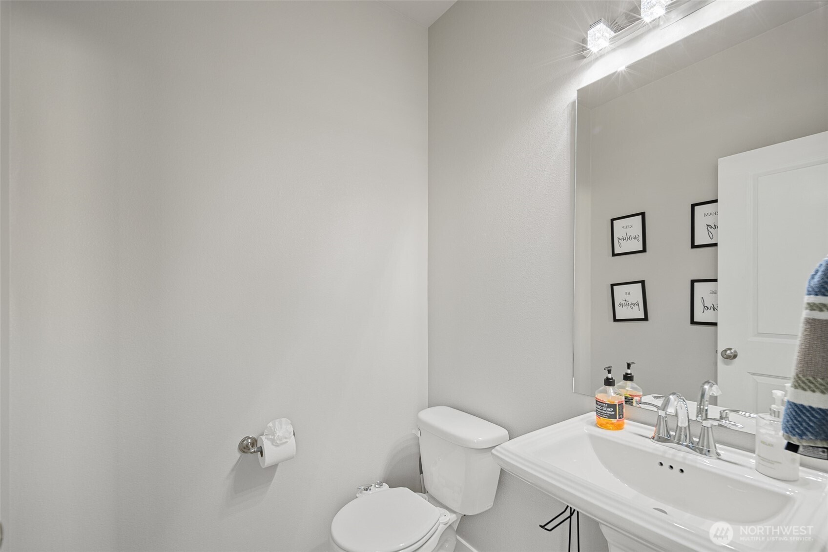 729 112th Street Southwest, Unit G1 Everett, WA 98204 - Photo 23 of 32 a bathroom with a sink mirror and toilet