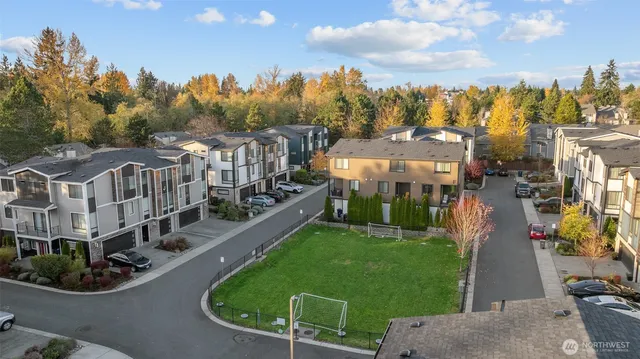 a view of multiple house with a outdoor space