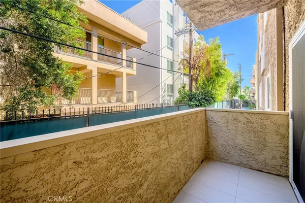 a view of pool with patio