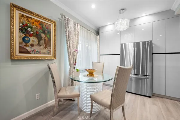 a kitchen with stainless steel appliances granite countertop a sink and a stove