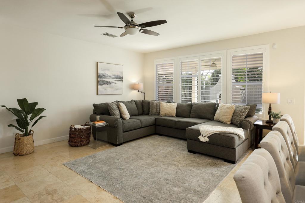 1446 Old Janal Ranch Road Chula Vista, CA 91915 - Photo 12 of 51 a living room with furniture and a large window