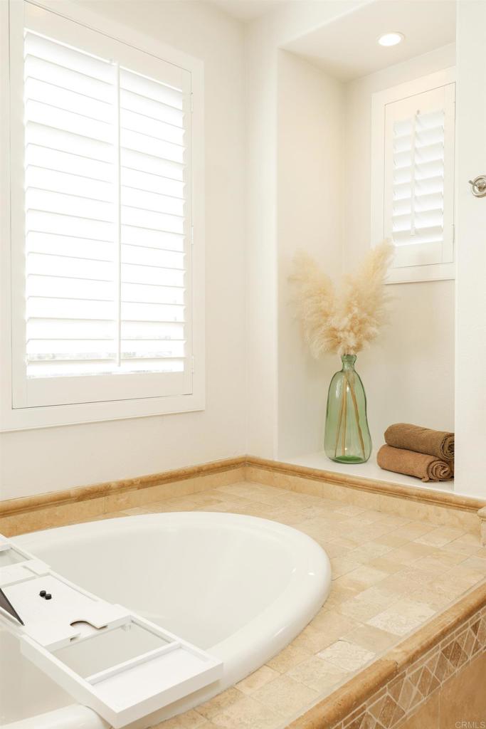 1446 Old Janal Ranch Road Chula Vista, CA 91915 - Photo 27 of 51 a view of a bath tub sitting in a bathroom