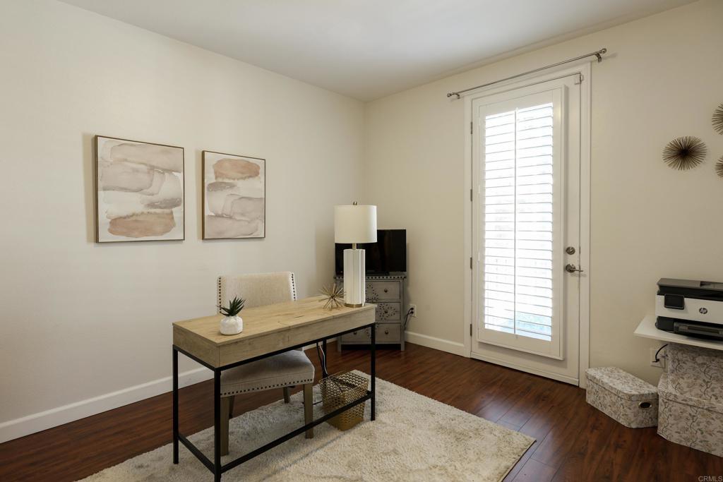 1446 Old Janal Ranch Road Chula Vista, CA 91915 - Photo 35 of 51 a view of a workspace with furniture and a window