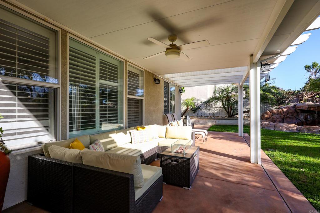 1446 Old Janal Ranch Road Chula Vista, CA 91915 - Photo 43 of 51 a bedroom with furniture and garden view