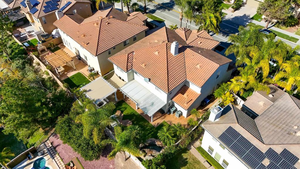 1446 Old Janal Ranch Road Chula Vista, CA 91915 - Photo 50 of 51 an aerial view of a house with a yard