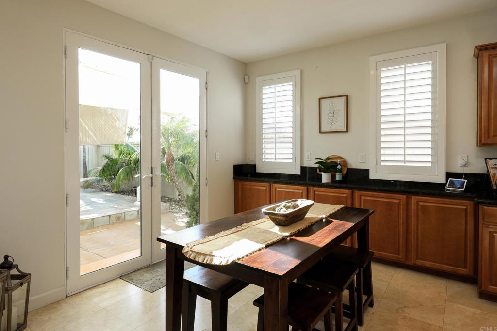 1446 Old Janal Ranch Road Chula Vista, CA 91915 - Photo 8 of 51 a view of a dining room with furniture and window