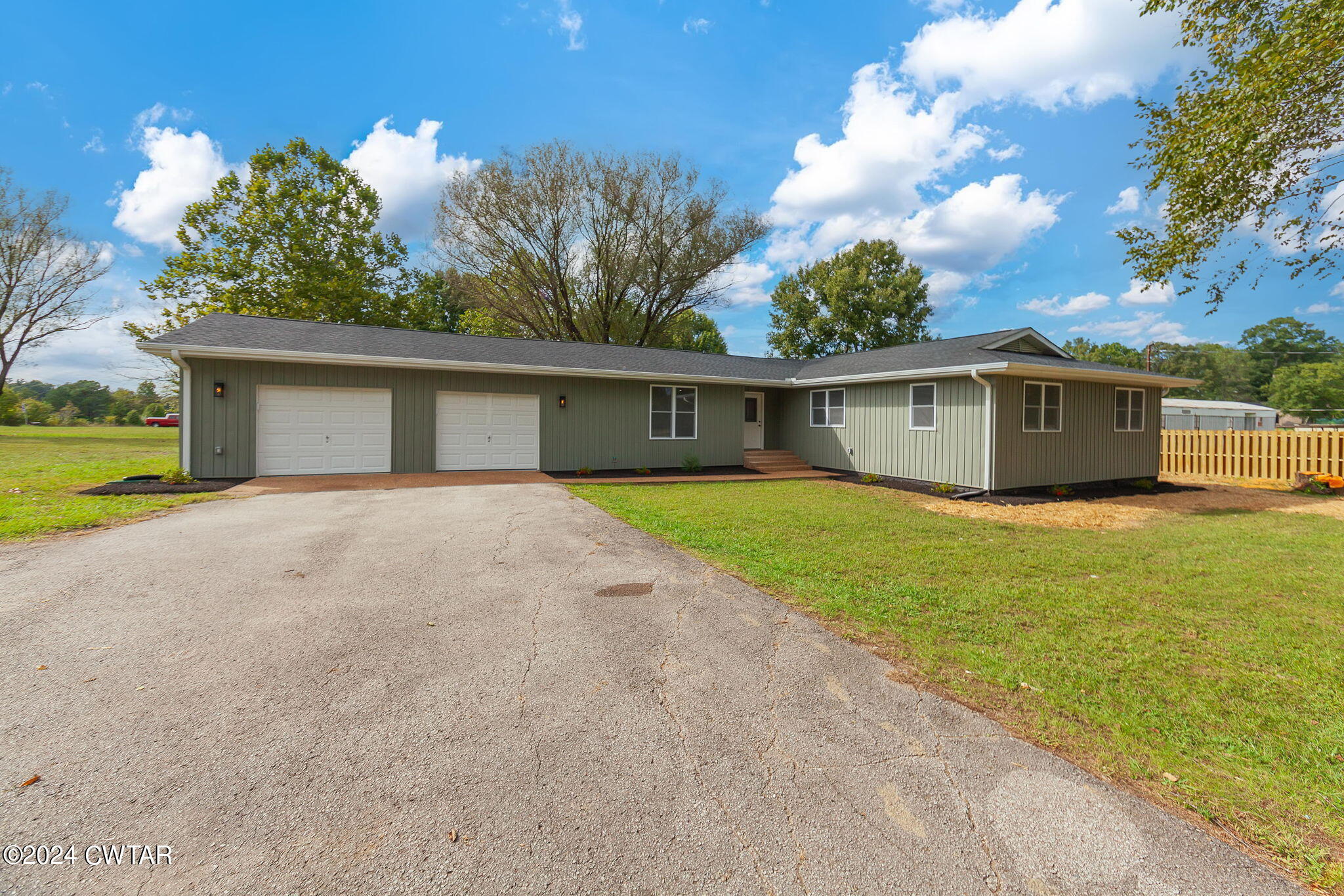 444 Diamond Grove Road Beech Bluff, TN 38313 - Photo 1 of 36 a view of a house with a yard