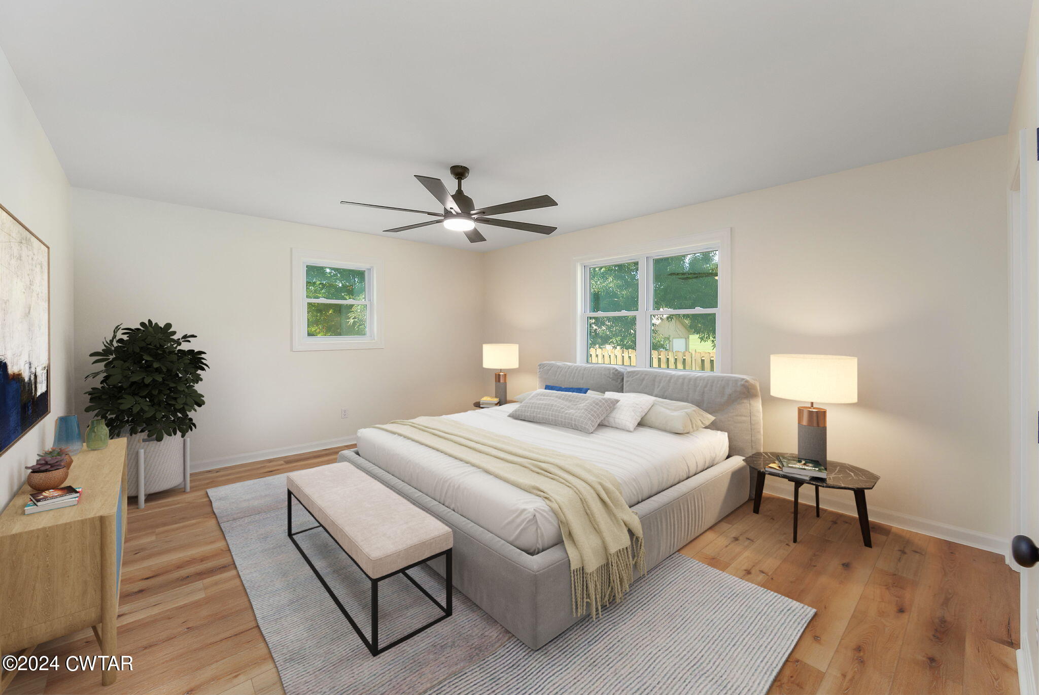444 Diamond Grove Road Beech Bluff, TN 38313 - Photo 3 of 36 a bedroom with a bed a chandelier and a couch