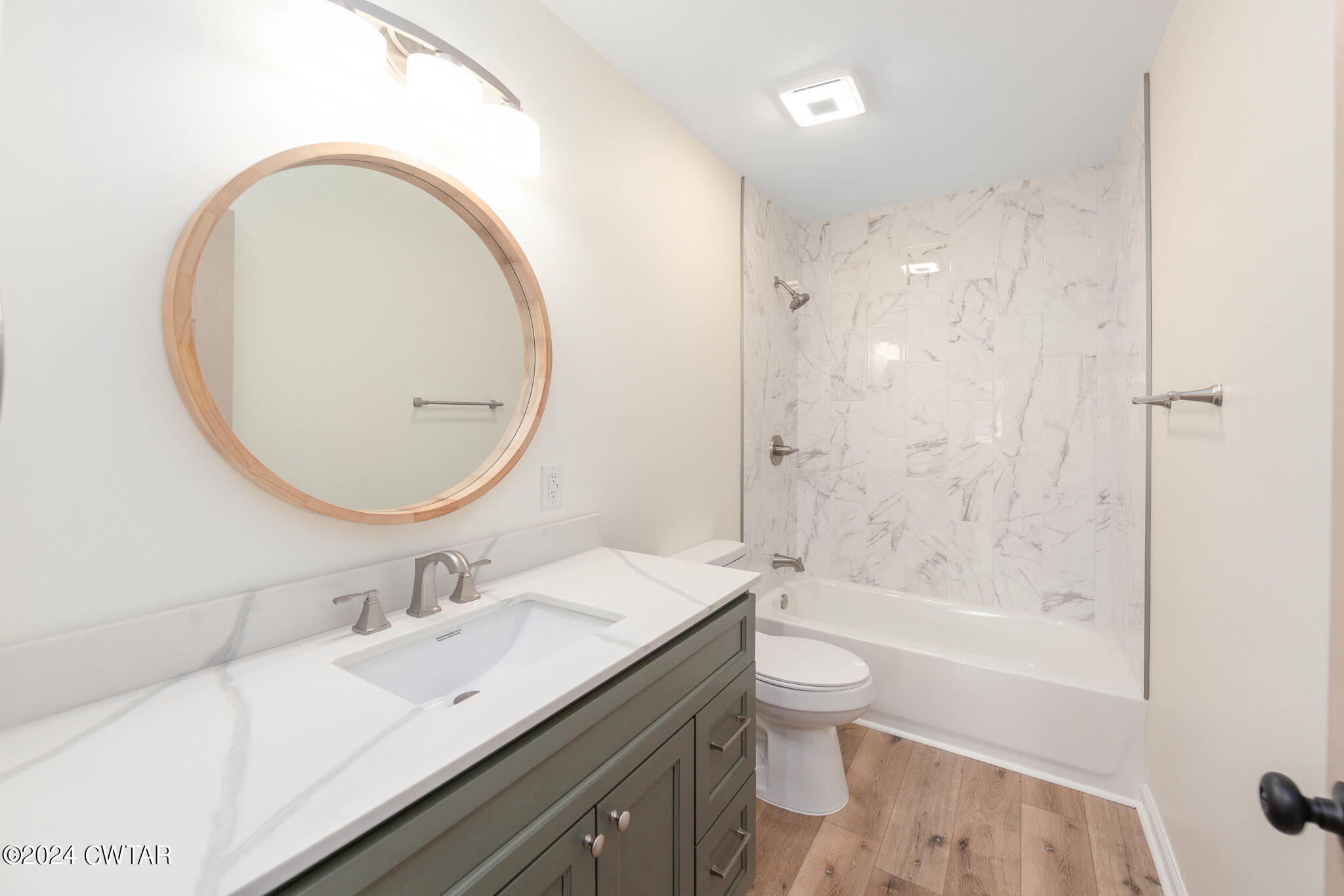 444 Diamond Grove Road Beech Bluff, TN 38313 - Photo 10 of 36 a bathroom with a sink a toilet and a mirror