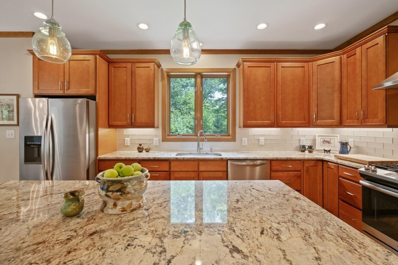 1932 Partridge Berry Drive Raleigh, NC 27606 - Photo 12 of 30 Who Doesn't Love a Window over the Kitchen Sink