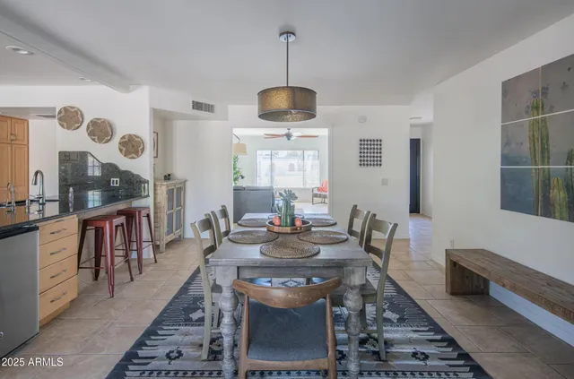 a view of a dining room with furniture