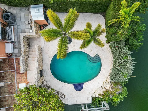 an aerial view of a swimming pool