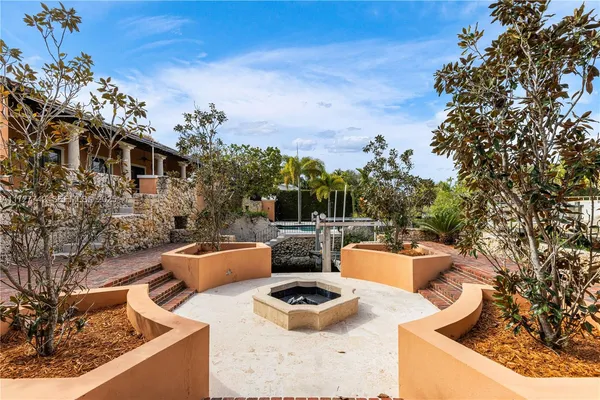 a view of a patio with swimming pool