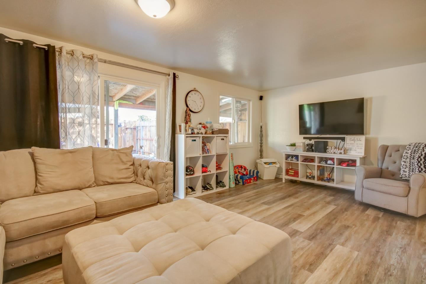 1350 San Blanco Drive Salinas, CA 93901 - Photo 11 of 22 a living room with furniture and a flat screen tv