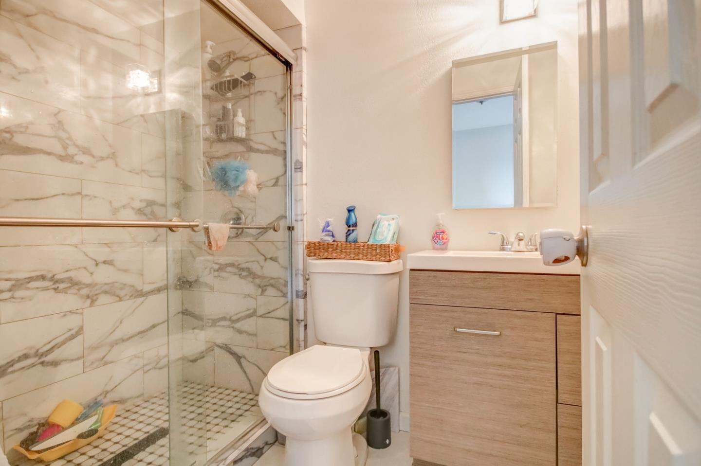 1350 San Blanco Drive Salinas, CA 93901 - Photo 16 of 22 a bathroom with a sink toilet and shower