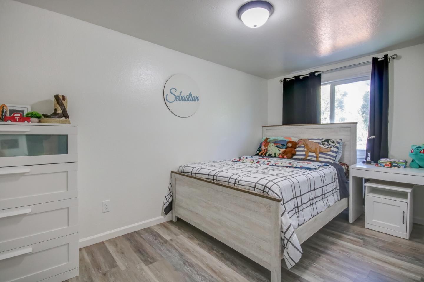 1350 San Blanco Drive Salinas, CA 93901 - Photo 4 of 22 a bedroom with a bed and a window