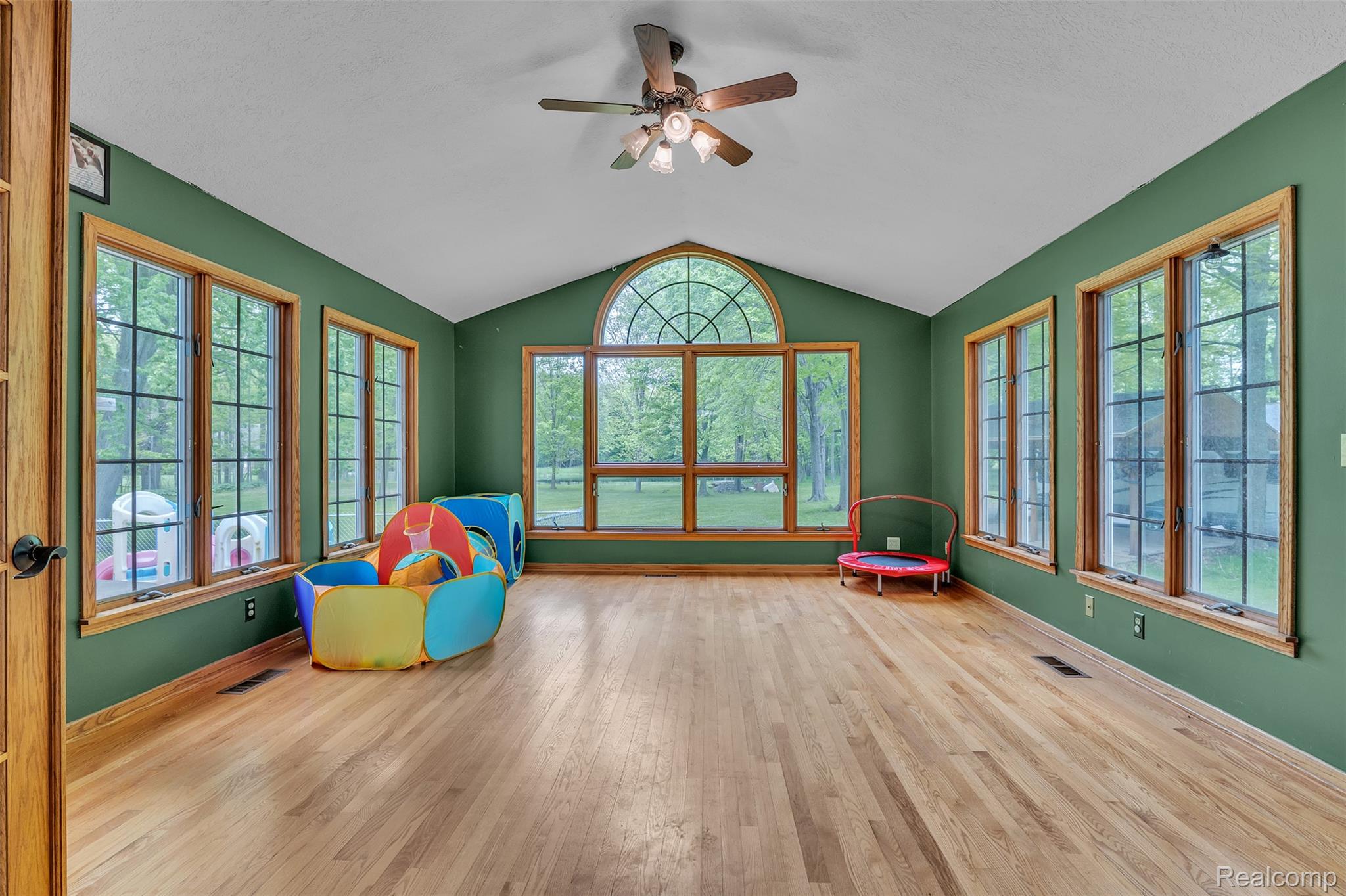 1345 Ives Road Mason, MI 48854 - Photo 8 of 92 Playroom with a ceiling fan and light wood-style floors