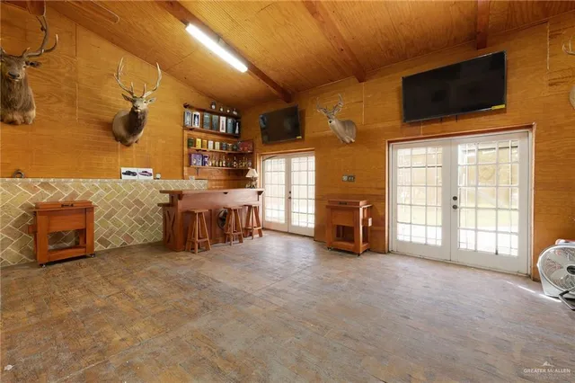 a view of a kitchen with furniture and a kitchen