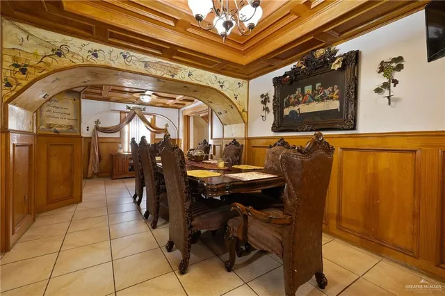 a view of a hallway with seating area