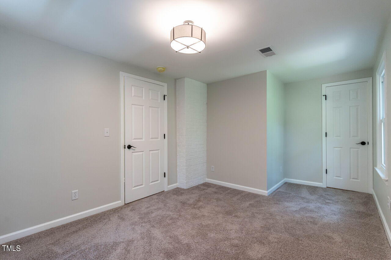 1940 Hilltop Road Raleigh, NC 27610 - Photo 13 of 25 026-1280x960-bedroom