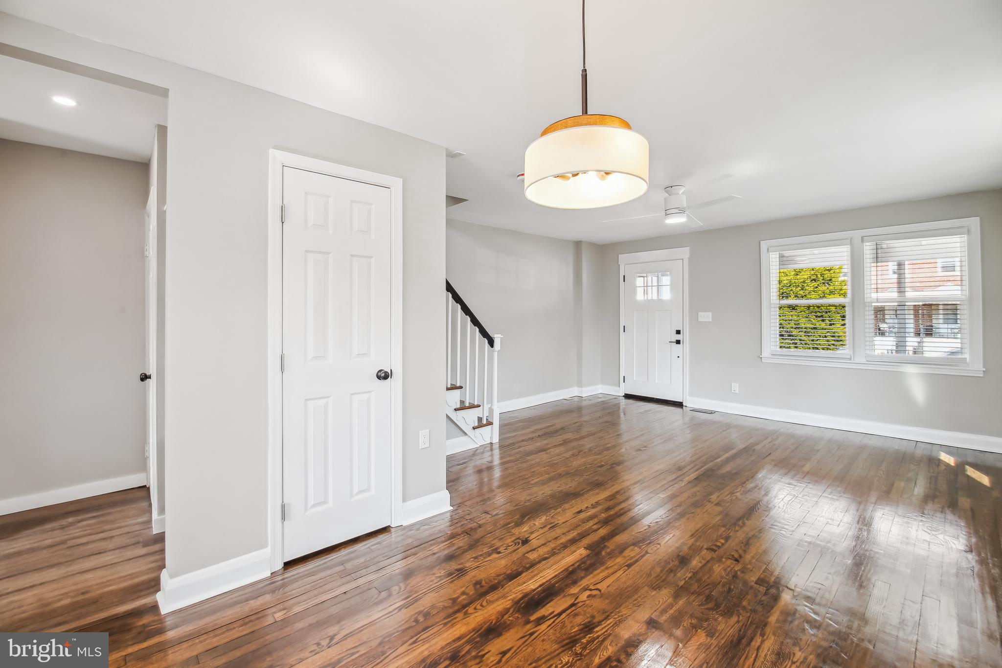 201 West Riverview Road Brooklyn, MD 21225 - Photo 14 of 35 Open Dining Room and Living Room w/Coat Closet