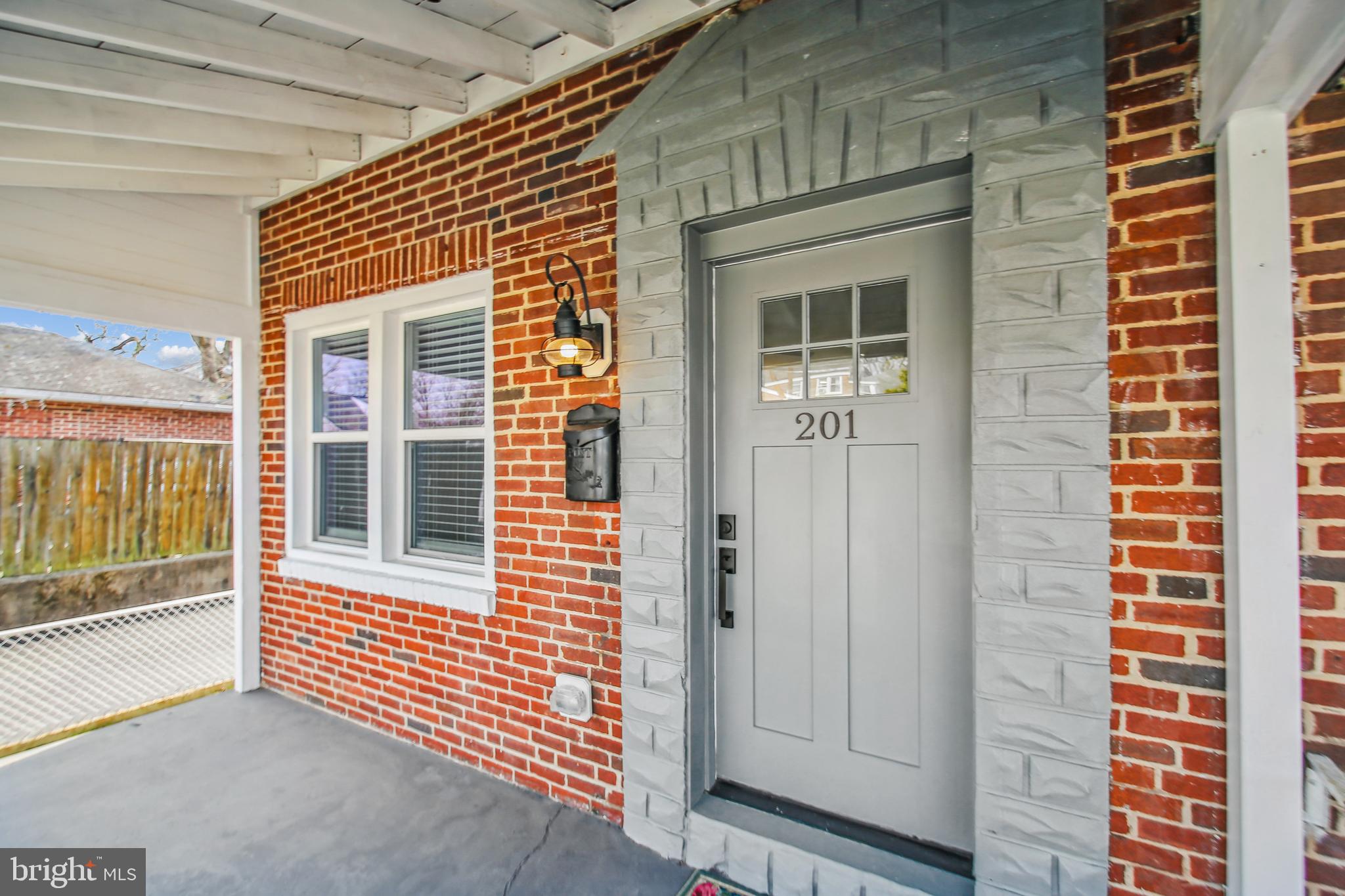 201 West Riverview Road Brooklyn, MD 21225 - Photo 3 of 35 Relaxing Front Porch w/New Entry Door & Windows
