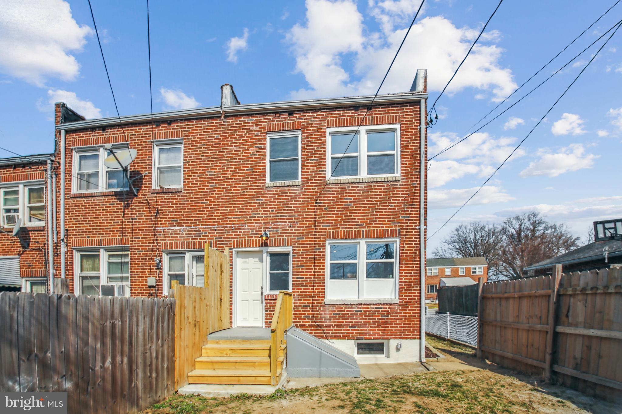 201 West Riverview Road Brooklyn, MD 21225 - Photo 33 of 35 Rear View of TH w/Back Steps & Basement Access