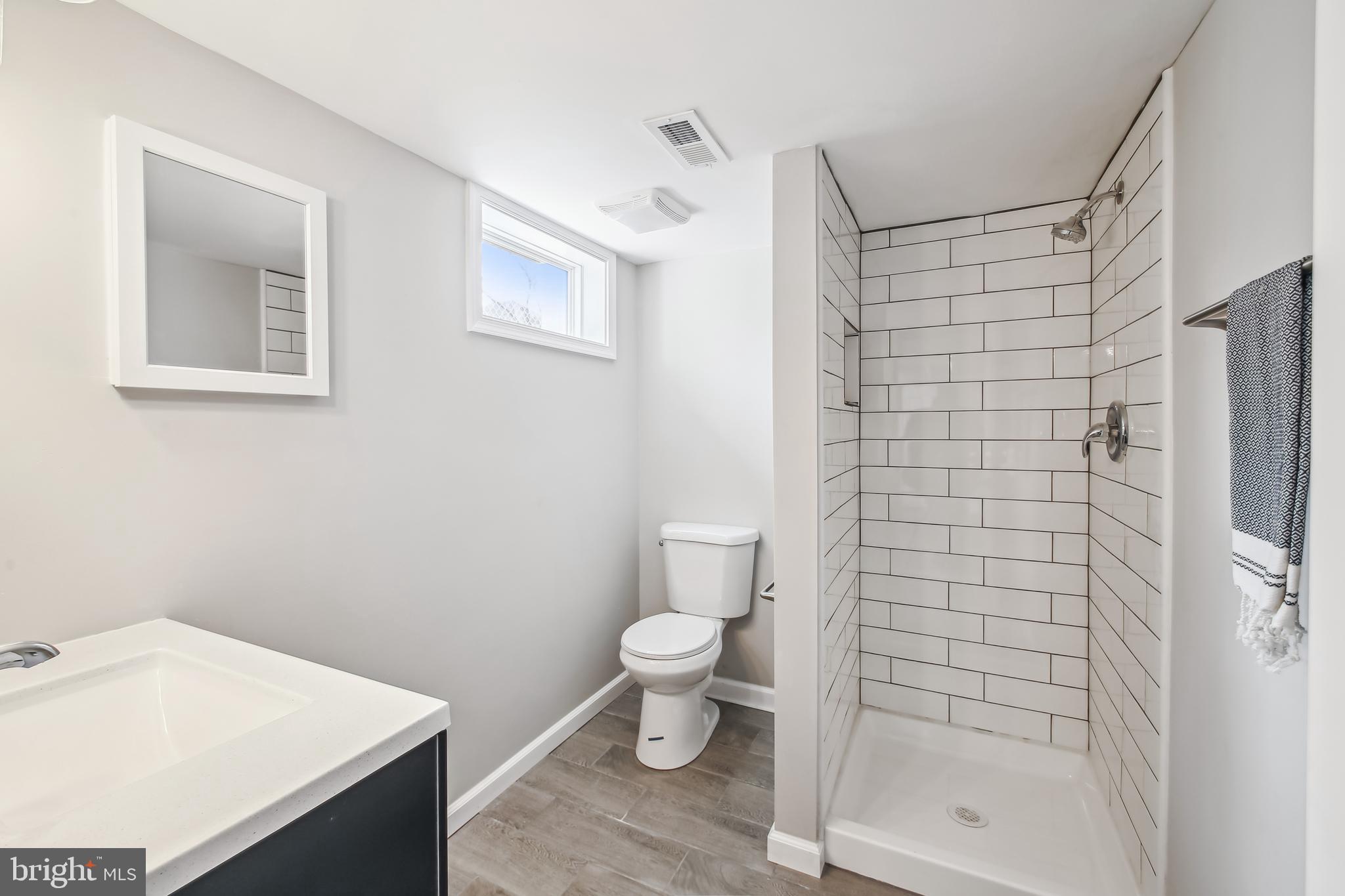 201 West Riverview Road Brooklyn, MD 21225 - Photo 10 of 35 New Primary Bath with Subway Tile Shower