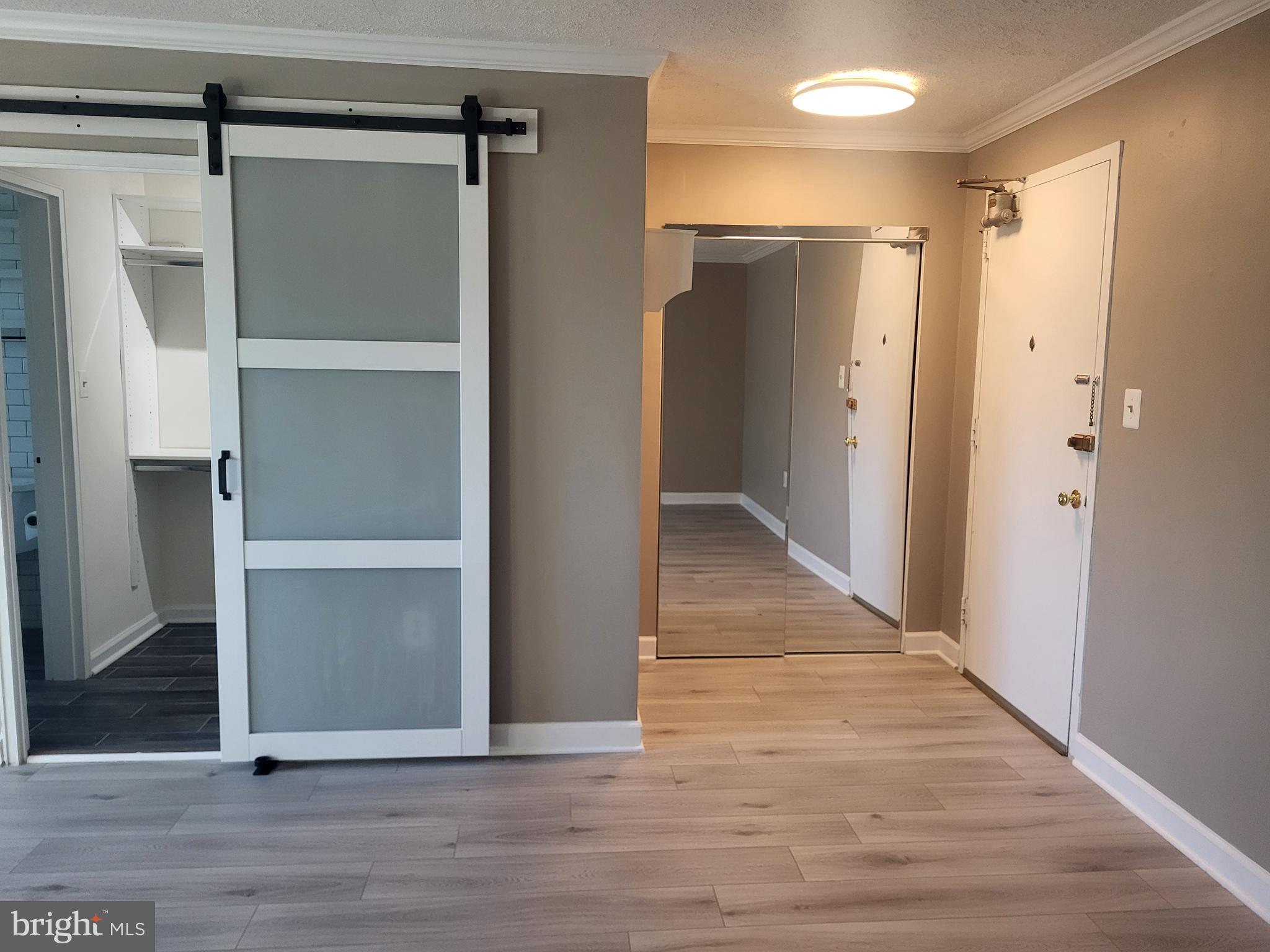 1200 South Arlington Ridge Road, Unit 710 Arlington, VA 22202 - Photo 3 of 26 Entry and Coat Closet