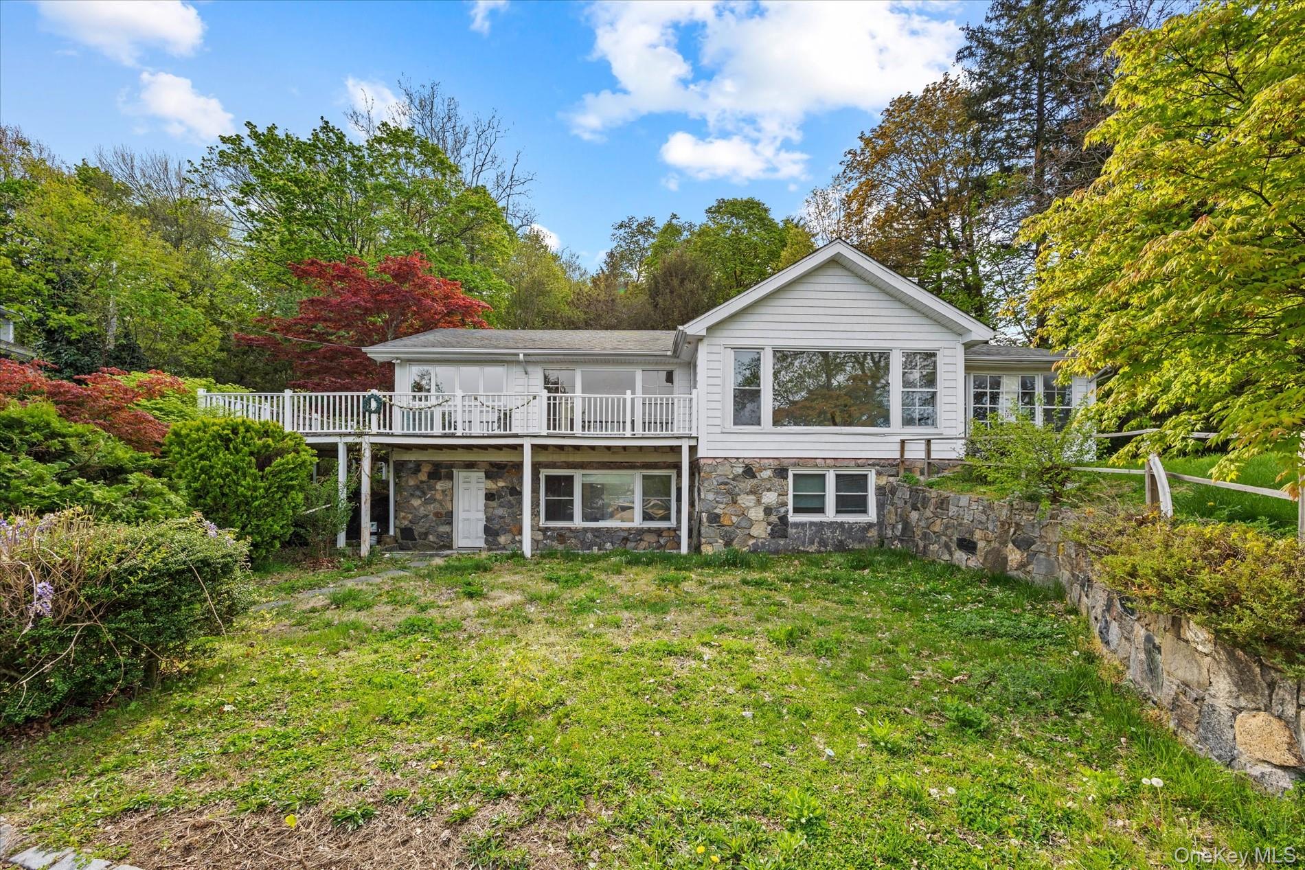 355 A East Shore Road Queens, NY 11023 - Photo 5 of 7 a house view with a garden space